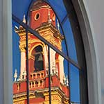 Reflection of Bell Tower in one of the Cultural Centers