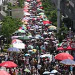Shoppers at the Full Moom Festival in Dali ... there's a police car in this crowd, trying to go south. It took half an hour!