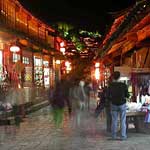 Ghostly tourists shopping at night