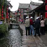 One of the picturesque canals lining Lijiang ...