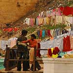 Lots of laundry being washed and dried on the ghats