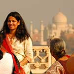 ...and having their photo taken with the Taj as a backdrop ...